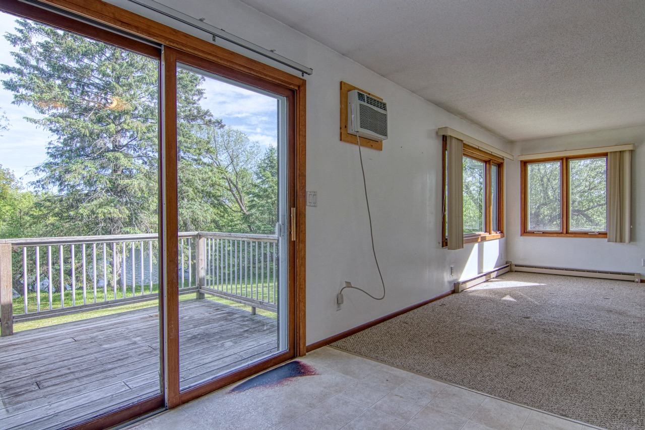 Bay Avenue unit with sliding door opening onto the deck